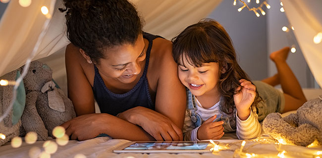 Mother and daughter using tablet